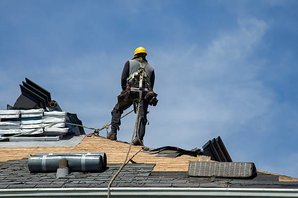Professional Gutter Installation technician working in Fulton, MS